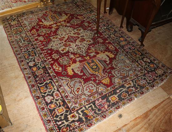 Red, blue & cream pattern rug(-)